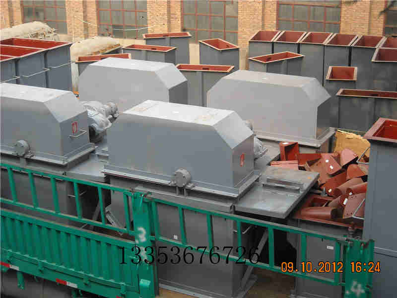 4臺(tái)斗式提升機(jī)機(jī)頭裝車(chē) 4臺(tái)斗式提升機(jī)機(jī)頭裝車(chē)